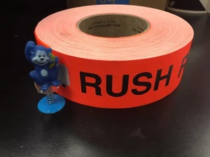 Roll of Orange "RUSH" labels - Picture 1 of 1