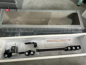 WSI 1:50 CAT CT 680 6x4 Grey + Rogers 3 Axle Trailer Black - Picture 1 of 3