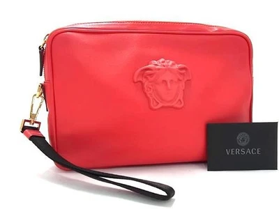 Auténtico bolso clutch de cuero VERSACE Medusa rojo hombres mujeres usado Foto 1 de 4