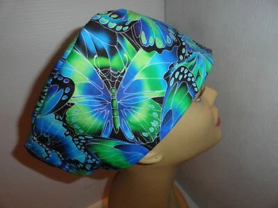 Ladies scrub hat large blue- turquoise butterflies Vashon style elastic in back - Image 1 of 4