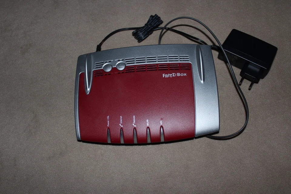 FRITZ!Box 7490 WLAN-Router mit Modem - Rot/Weiß (20002584) - Bild 1 von 1