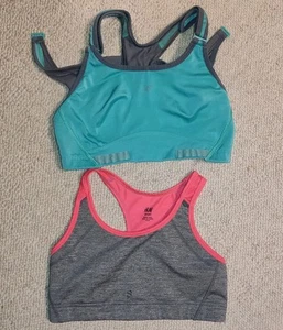 2 Sport BHs in Gr. M: H&M und New Balance - Bild 1 von 9