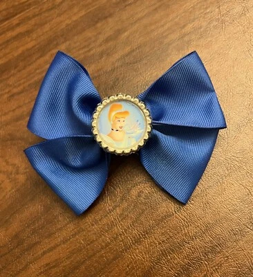 Disney Cinderella Princess Blue Bottle Cap 4.5-Inch Girl’s Bow Hair Accessory - Image 1 of 4