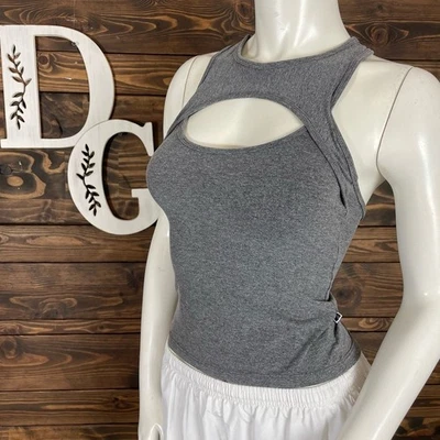 Adithiva | Camiseta sin mangas deportiva de entrenamiento escote recortado gris jaspeado Foto 1 de 4