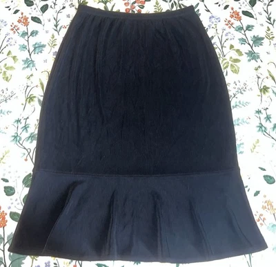Chico’s Travelers black stretch waist straight fit skirt with ruffle hem Size 1 - Image 1 of 4