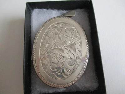 Medallón vintage grande con apertura grabada de plata de ley 925 con sello Foto 1 de 4