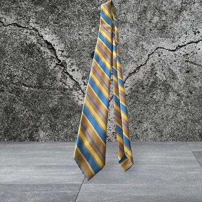 Gravata retrô vintage Wemlon tecido WEMBLEY MARROM azul anos 70-80 52”x3,50” masculina - Imagem 1 de 4