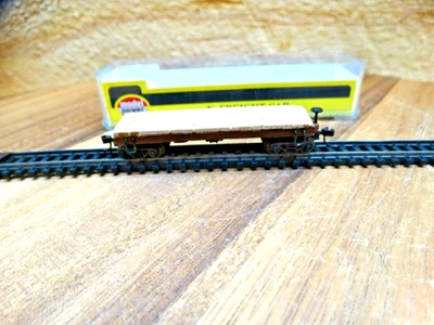 Model Power Artisan-Altered N Scale 34' Flat Skid Car with Wood Platform - Image 1 of 4