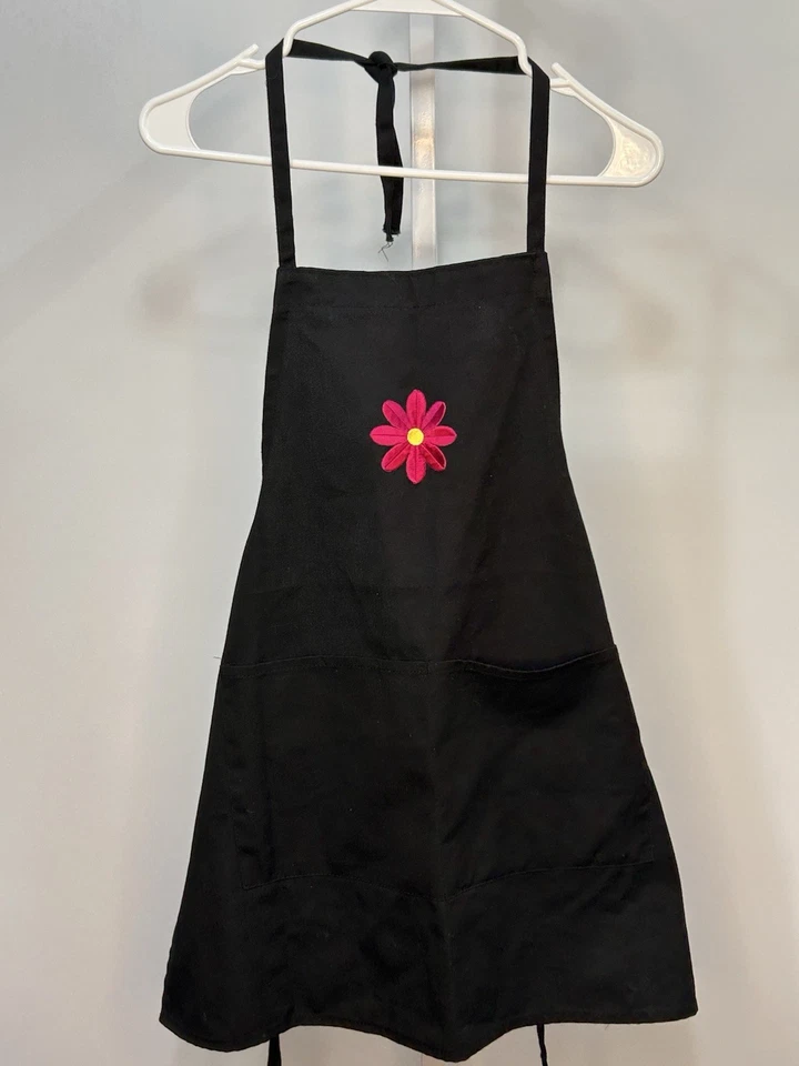 Apron Black Unisex Medium Length Around Neck Embroidered Flower. 2Y - Image 1 of 3