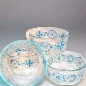 Set of 4 Vintage Pyrex Clear Glass Bowls Blue Teal Floral Pinwheel Design - Picture 1 of 2