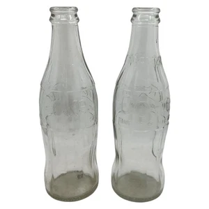 Pair of Clear 10 Oz Coca Cola Bottles Embossed Logos Contour Shape 68 and 71 - Picture 1 of 9