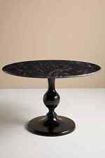 Anthropologie black marble topped dining table with aluminium pedestal
