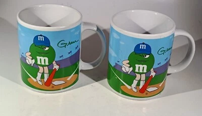 M&M Candy Coffee Mugs Green Yellow Set of 2 Vintage 2002 Galerie  - Image 1 of 4