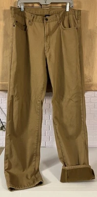 Pantalones de mezclilla de lona azul completo para hombre 36x34 marrón aislado forrados de vellón Foto 1 de 4