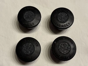 4 NOS BLACK VINTAGE PUSH IN DELCO  BATTERY CAPS NEW - Picture 1 of 3