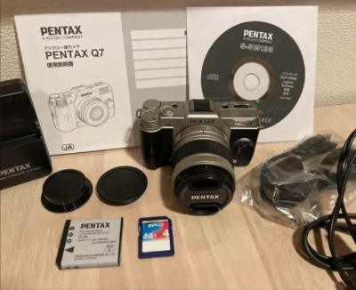 Pentax Q7 Mirrorless Camera + Accessories Bundle – Works Great, Includes Battery - Image 1 of 4