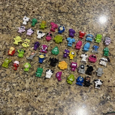 Gogos Crazy Bones Lot of 50 Series 1 Mixed Colors #6 - Image 1 of 4