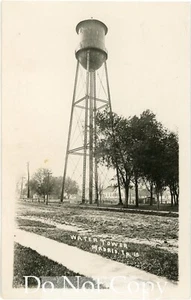 1910s RPPC Postcard MADRID IOWA Town's Water Tower near Water Street Bridge - Picture 1 of 3
