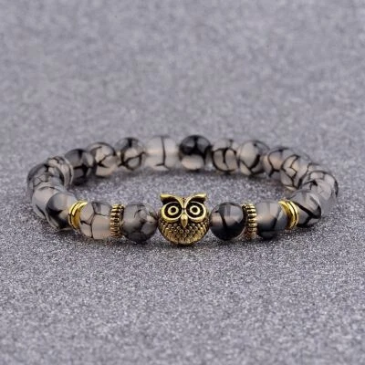 Casco de piedras preciosas redondas naturales de 8 mm con cuentas de búho león hecho a mano pulseras joyería Foto 1 de 4