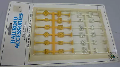 HO Plasticville item No. 42-2304 RAIL ROAD AND STREET SIGNS YELLLOW & WHITE NOS - Image 1 of 2