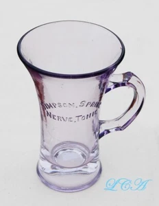 Antigua taza publicitaria SIMPSON SPRING NERVE TONIC original color sol AMATISTA - Imagen 1 de 3