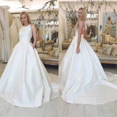 Vestidos de novia sencillos cuello halter sin espalda tren de barrido satinado vestidos de novia Foto 1 de 4