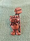 J J signed copper tone cat figure standing below birdhouse w/ feathers in mouth