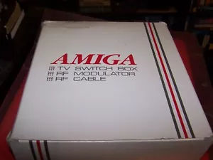Caja de interruptor de TV Amiga, modulador de RF y cable de RF - Imagen 1 de 2