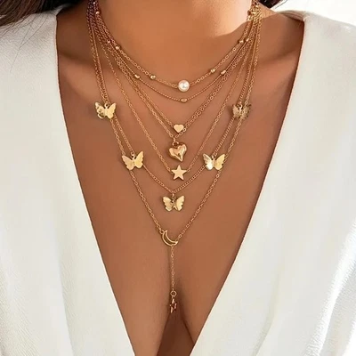 Elegante conjunto de collar colgante de corazón de aleación de zinc con borla de mariposa para mujer Foto 1 de 4