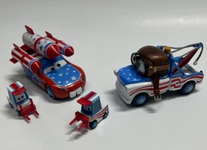 Disney Pixar Cars Super Stunt Show Mater Aviator Mater Die-Cast 4 Stück Neuwertig - Bild 1 von 14
