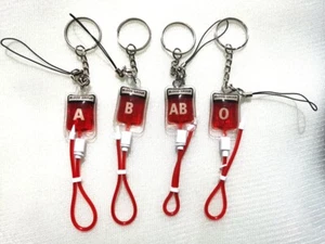 100 pcs Blood Type A B O AB Plasma Pack Blood Bag PVC Pendant DIY Keychain - Picture 1 of 3