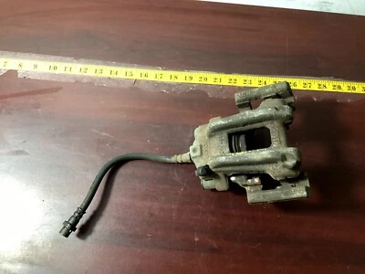 Pinza de freno trasera derecha BMW 328I XDRIVE F30 2013-2016 sedán OEM. Foto 1 de 4