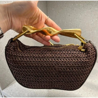 Bolso de Mano Tejido a Mano con Asa Dorada Exquisito Cuero Diseño de Lazo Cartera Marrón Cremallera  Foto 1 de 4