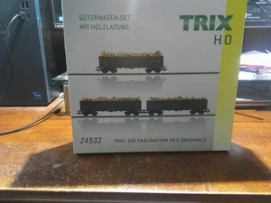 TRIX HO SCALE ITEM # 24532 FREIGHT CAR SET WITH LOAD OF WOOD - Picture 1 of 6