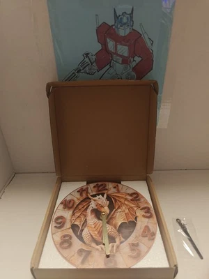 Reloj de pared de aluminio con tema dragón volcánico, perfecto para amantes de mascotas y Valenti Foto 1 de 4