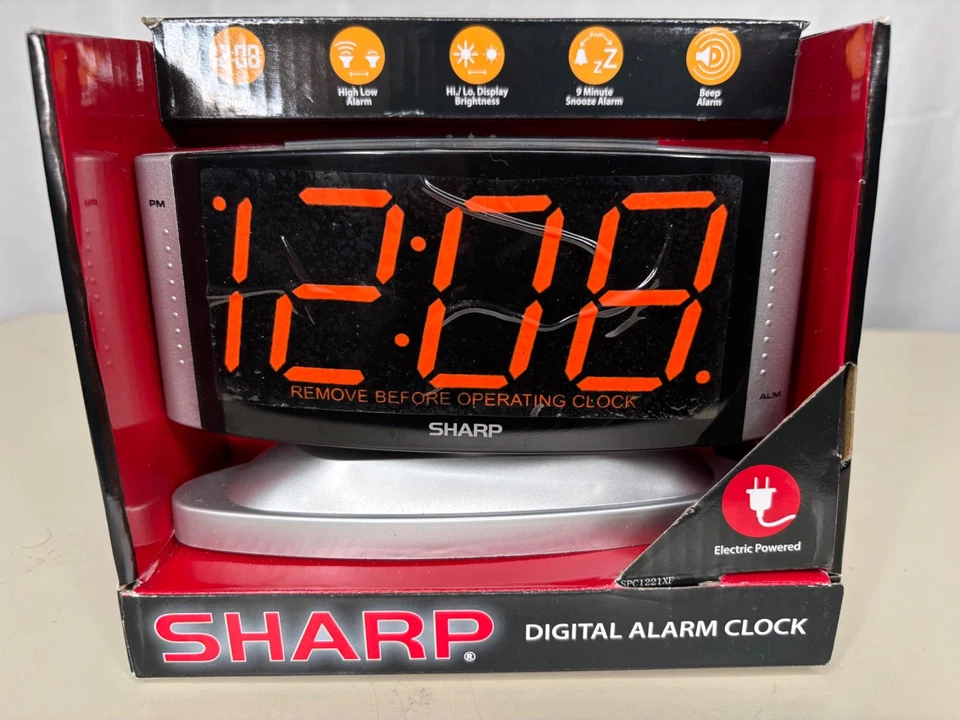 Sharp LED Digital Alarm Clock Swivel Base Silver Case Red Display SPC033D