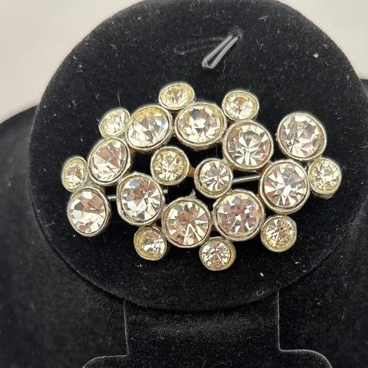 Broche prendedor vintage de diamantes de imitación tono plata floral joyería distintiva Foto 1 de 4