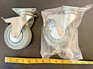 Two (2) 4" gray swivel casters, never used but dusty - Picture 1 of 6