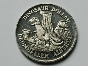 Drumheller AB CANADA 1977 DINOSAUR Trade DOLLAR Token with Coal Mine Bridge - Picture 1 of 2