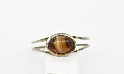 Brazalete abrazadera con bisagras cabujón ámbar lucita con bandas de oro en T de 6,75" Foto 1 de 3