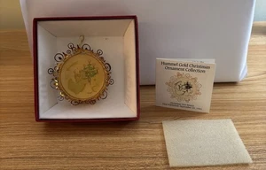 THE HUMMEL GOLDEN CHRISTMAS ORNAMENT COLLECTION "CHRISTMAS TREE BEARER" 1987 - Picture 1 of 6