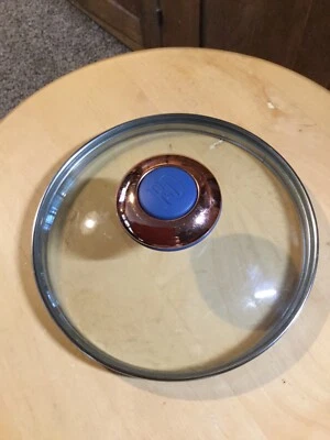 Tapa de cristal P D recortada en acero inoxidable. Llanta a llanta de 6,25"" 6,75” borde a borde. D6.  Foto 1 de 4
