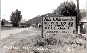 "This Little Town is Heaven" Entering JOSEPH, Oregon OR RPPC - Postcard - Picture 1 of 2