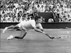 Roger Taylor in action against Rod Laver in Wim... - Vintage Photograph 780569