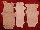 BUNDLE OF 7 x  FIRST SIZE BABY VESTS. 3 PLAIN &  4  PATTERNED  0-3 MTHS
