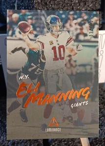 2018 Panini Luminance #47 Eli Manning /225 Orange Parallel Football Card  - Picture 1 of 2