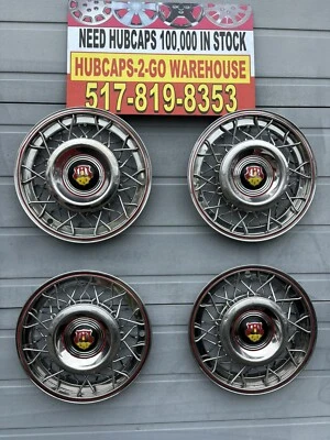 Hermoso conjunto de 4 cables Oldsmobile 1951-53 OEM raros usados color brillante medio Foto 1 de 4