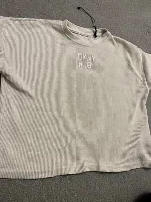 Dkny age 12 girls beige cropped knitted top - Image 1 of 3