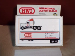 ERTL HWI HARDWARE INTERNATIONAL TRACTOR TRAILER  1/64 - #9664UO - NEW - Picture 1 of 4