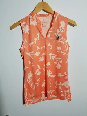 NUEVO CON ETIQUETAS POLO MUJER NIKE DRI-FIT S/L, TALLA: XS, COLOR: NARANJA FLORAL (J504) Foto 1 de 3